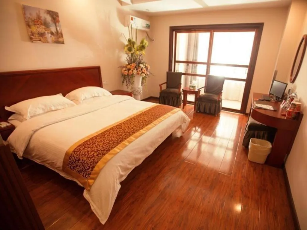 Bed in GreenTree Inn Lianyungang Guanyun Bus Station Zhenxing Garden Express Hotel