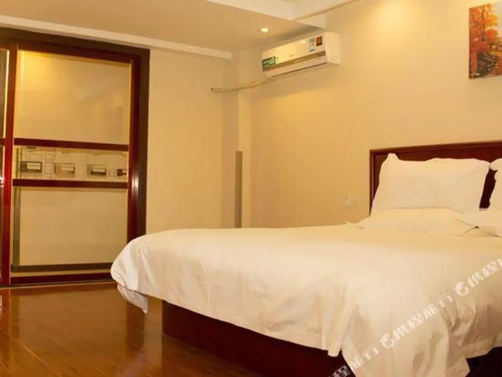 Bed in GreenTree Inn Lianyungang Guanyun Bus Station Zhenxing Garden Express Hotel