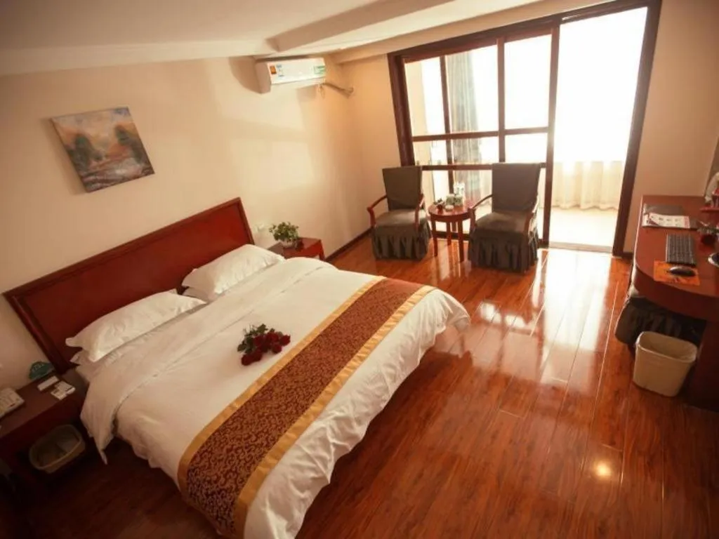 Bed in GreenTree Inn Lianyungang Guanyun Bus Station Zhenxing Garden Express Hotel