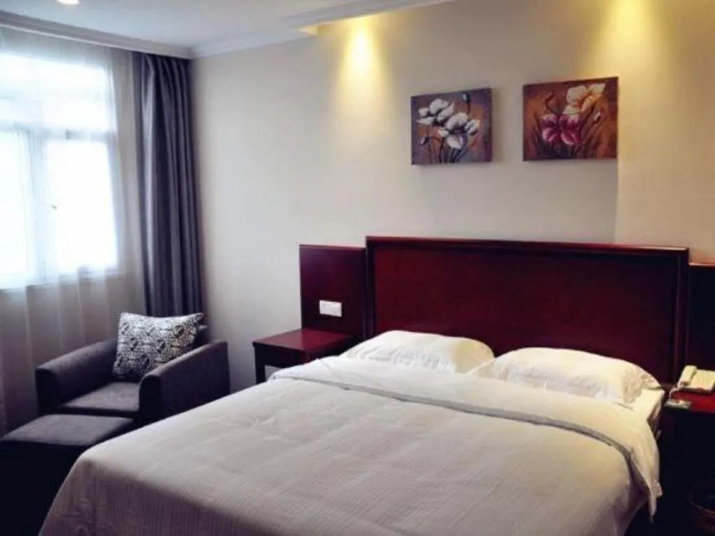 Bed in GreenTree Inn Lianyungang Guanyun Bus Station Zhenxing Garden Express Hotel