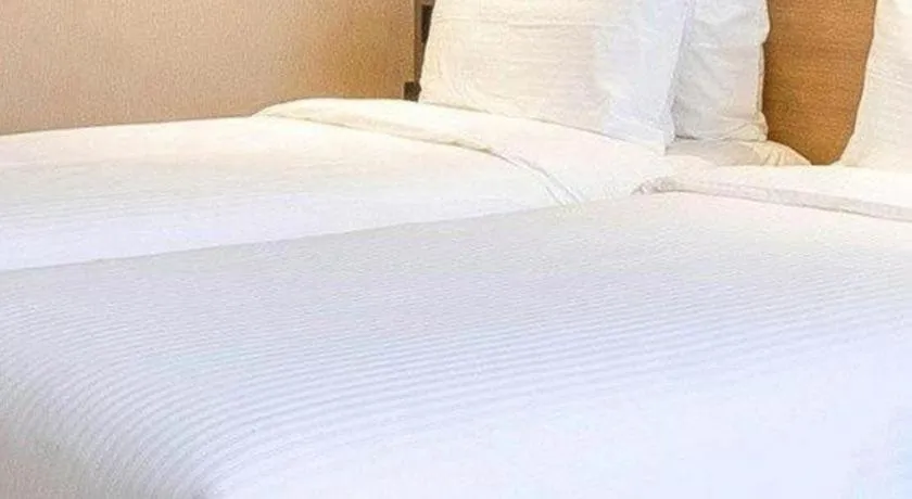 Bed in GreenTree Inn Lianyungang Guanyun Bus Station Zhenxing Garden Express Hotel