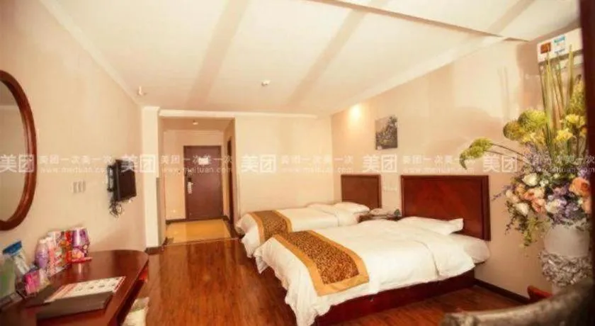 Bed in GreenTree Inn Lianyungang Guanyun Bus Station Zhenxing Garden Express Hotel