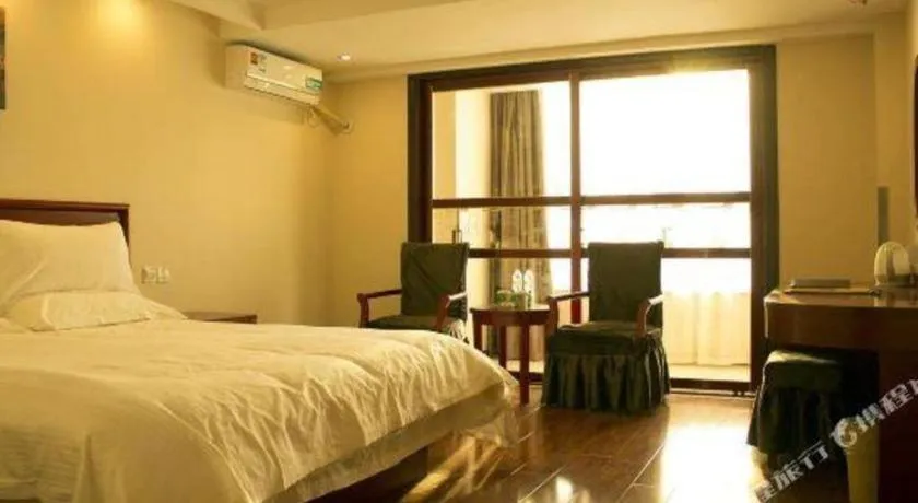 Bed in GreenTree Inn Lianyungang Guanyun Bus Station Zhenxing Garden Express Hotel