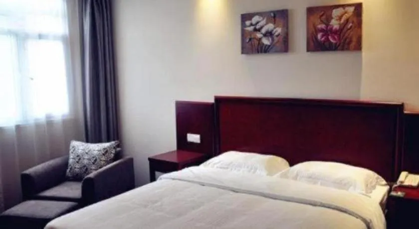 Bed in GreenTree Inn Lianyungang Guanyun Bus Station Zhenxing Garden Express Hotel