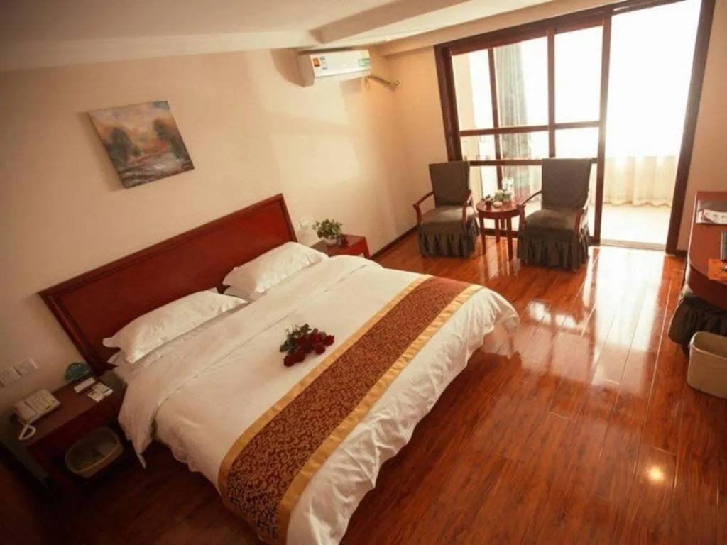 Bed in GreenTree Inn Lianyungang Guanyun Bus Station Zhenxing Garden Express Hotel