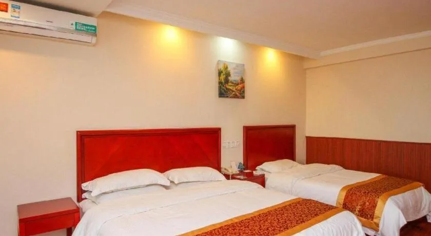 Bed in GreenTree Inn Lianyungang Guanyun Bus Station Zhenxing Garden Express Hotel