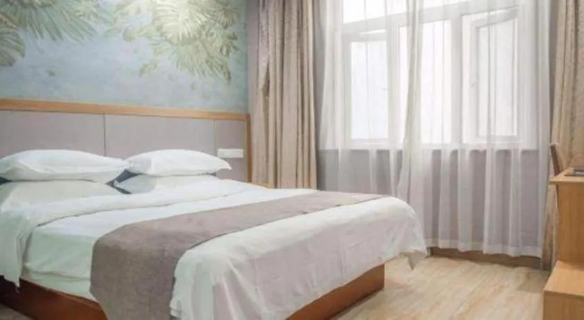Bed in GreenTree Inn Zhejiang Ningbo Exhibition and Convention Center Bus East Station Express Hotel