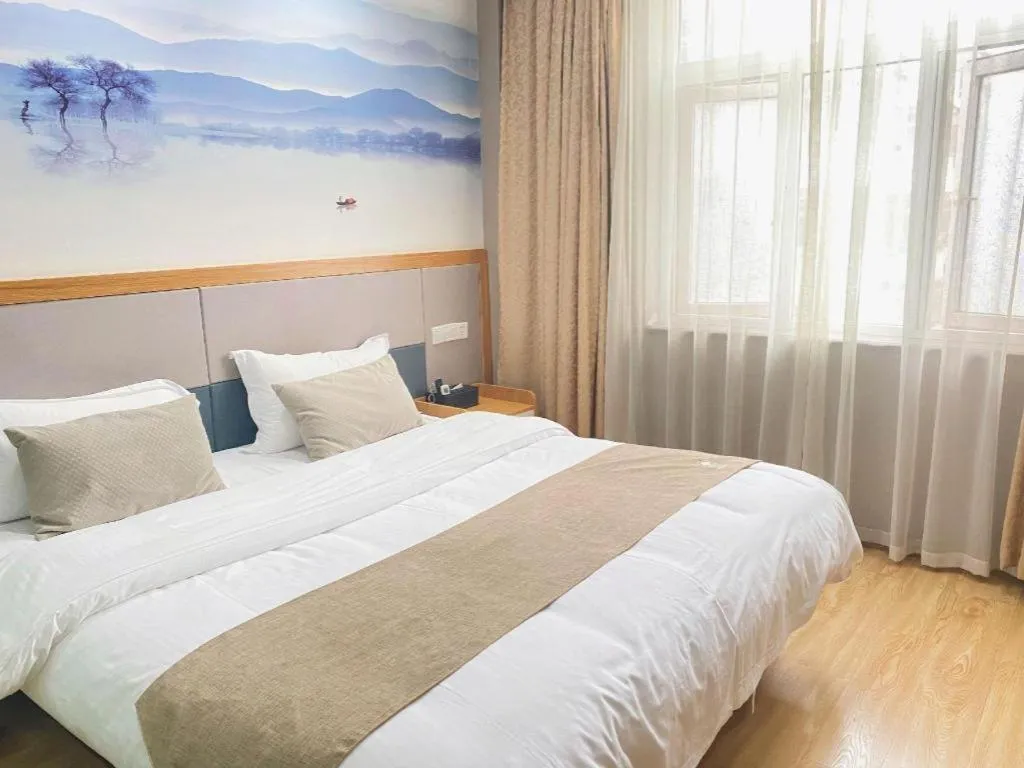 Bed in GreenTree Inn Zhejiang Ningbo Exhibition and Convention Center Bus East Station Express Hotel
