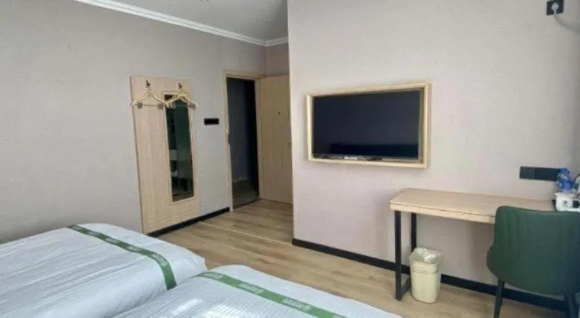 Bed in GreenTree Inn Zhejiang Ningbo Exhibition and Convention Center Bus East Station Express Hotel