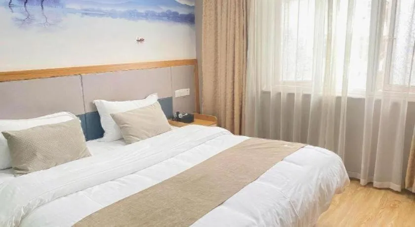 Bed in GreenTree Inn Zhejiang Ningbo Exhibition and Convention Center Bus East Station Express Hotel