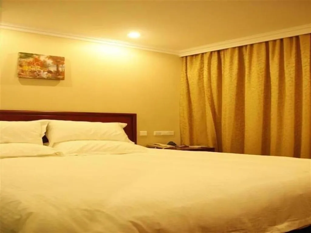 Bed in GreenTree Inn Zhejiang Ningbo Exhibition and Convention Center Bus East Station Express Hotel