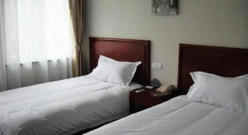 Bed in GreenTree Inn Zhejiang Ningbo Exhibition and Convention Center Bus East Station Express Hotel
