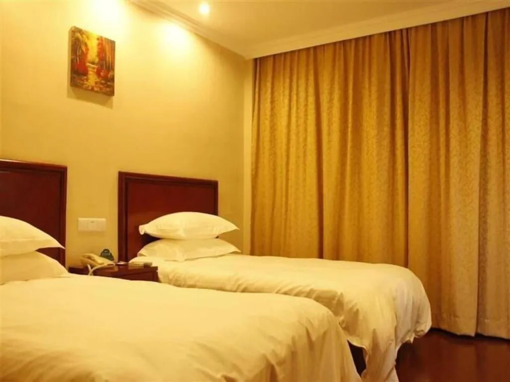 Bed in GreenTree Inn Zhejiang Ningbo Exhibition and Convention Center Bus East Station Express Hotel