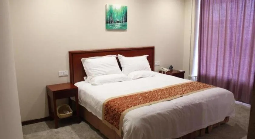 Bed in GreenTree Inn Zhejiang Ningbo Exhibition and Convention Center Bus East Station Express Hotel