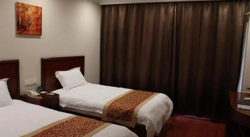 Bed in GreenTree Inn Zhejiang Ningbo Exhibition and Convention Center Bus East Station Express Hotel
