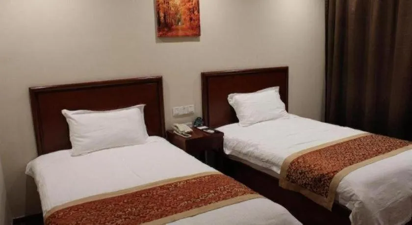 Bed in GreenTree Inn Zhejiang Ningbo Exhibition and Convention Center Bus East Station Express Hotel
