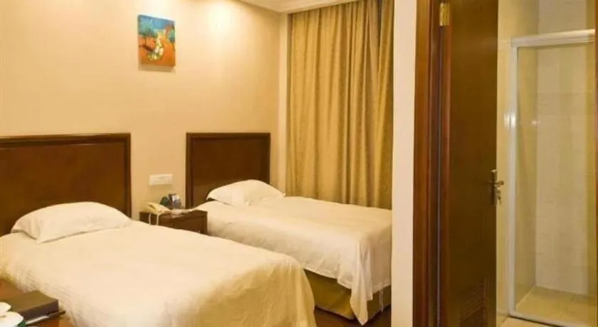 Bed in GreenTree Inn Zhejiang Ningbo Exhibition and Convention Center Bus East Station Express Hotel
