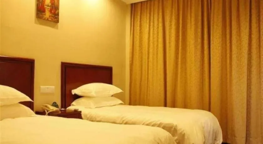 Bed in GreenTree Inn Zhejiang Ningbo Exhibition and Convention Center Bus East Station Express Hotel