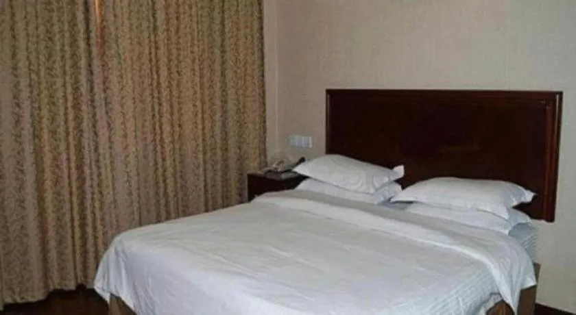 Bed in GreenTree Inn Zhejiang Ningbo Exhibition and Convention Center Bus East Station Express Hotel