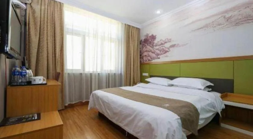 Bed in GreenTree Inn Zhejiang Ningbo Exhibition and Convention Center Bus East Station Express Hotel