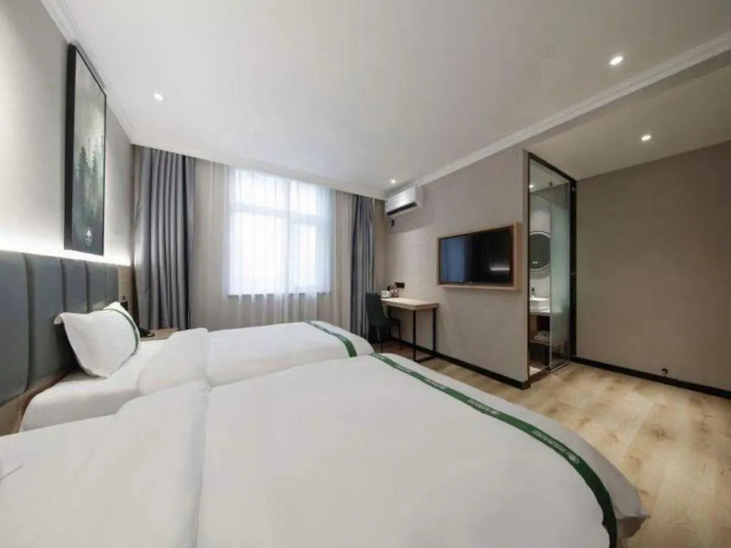 Bed in GreenTree Inn Zhejiang Ningbo Exhibition and Convention Center Bus East Station Express Hotel