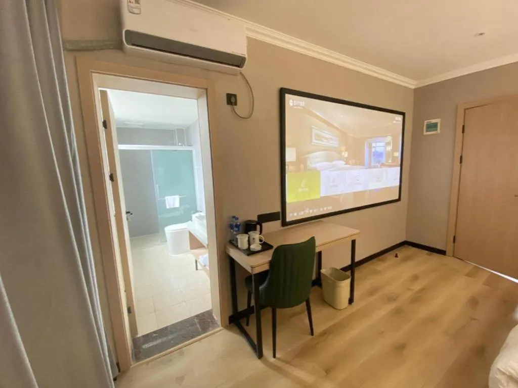 Bed in GreenTree Inn Zhejiang Ningbo Exhibition and Convention Center Bus East Station Express Hotel