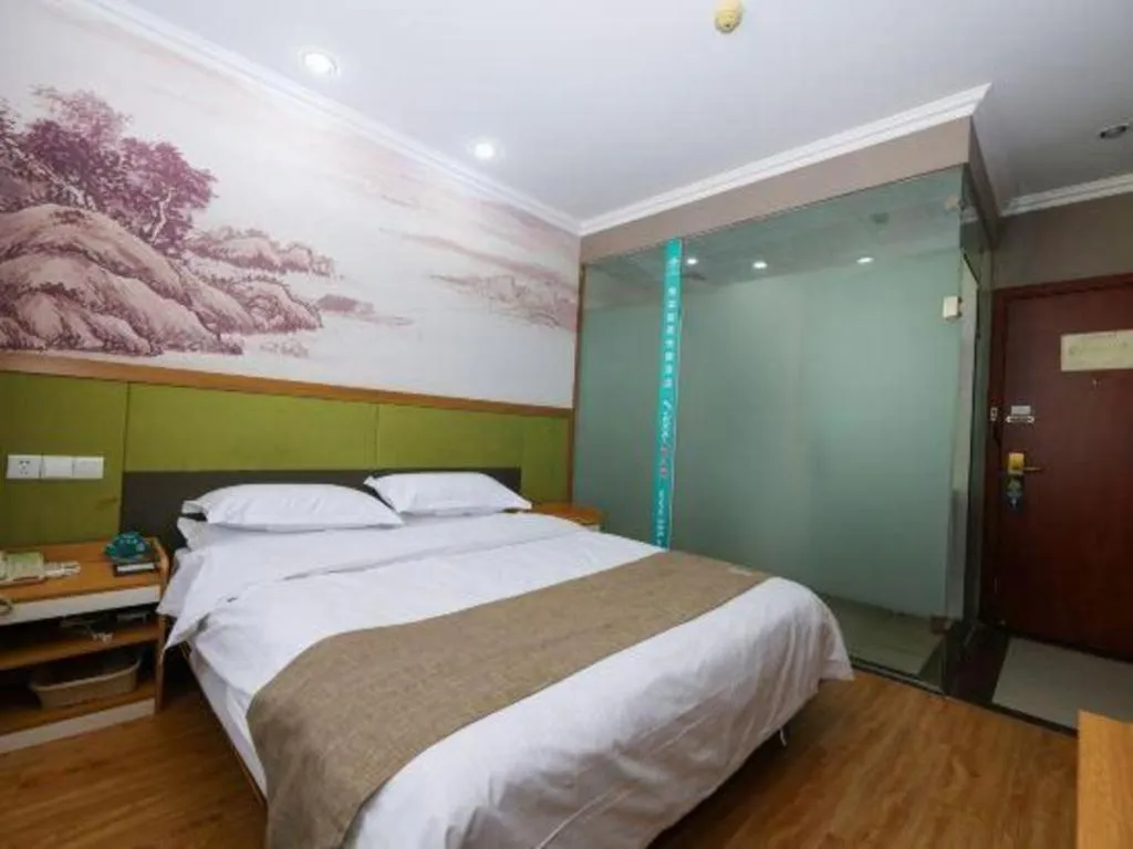 Bed in GreenTree Inn Zhejiang Ningbo Exhibition and Convention Center Bus East Station Express Hotel