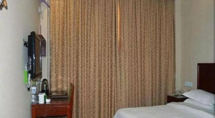 Bed in GreenTree Inn Zhejiang Ningbo Exhibition and Convention Center Bus East Station Express Hotel