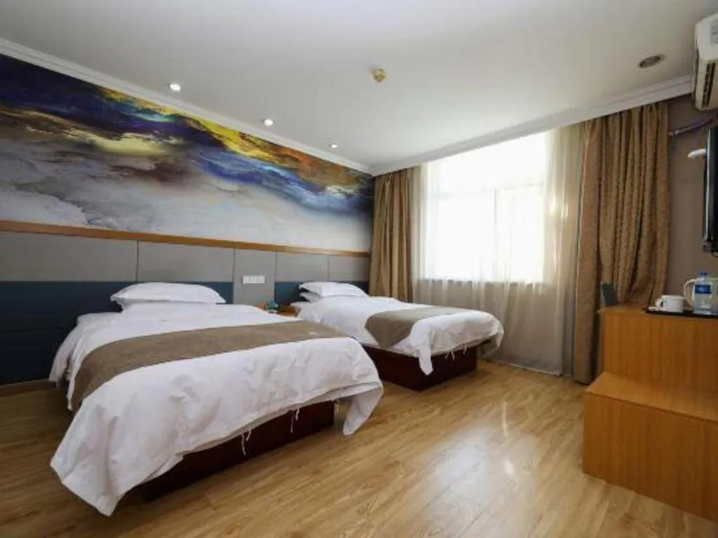 Bed in GreenTree Inn Zhejiang Ningbo Exhibition and Convention Center Bus East Station Express Hotel