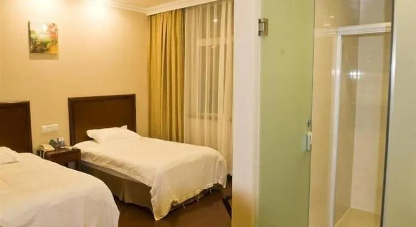Bed in GreenTree Inn Zhejiang Ningbo Exhibition and Convention Center Bus East Station Express Hotel