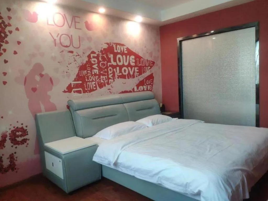 Bed in GreenTree Inn Guangzhou Baiyun International Airport Huaxi Road Express Hotel