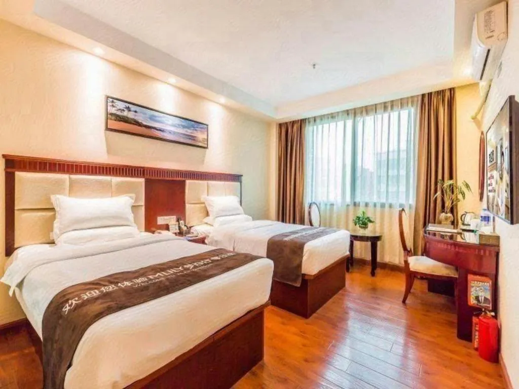 Bed in GreenTree Inn Guangzhou Baiyun International Airport Huaxi Road Express Hotel