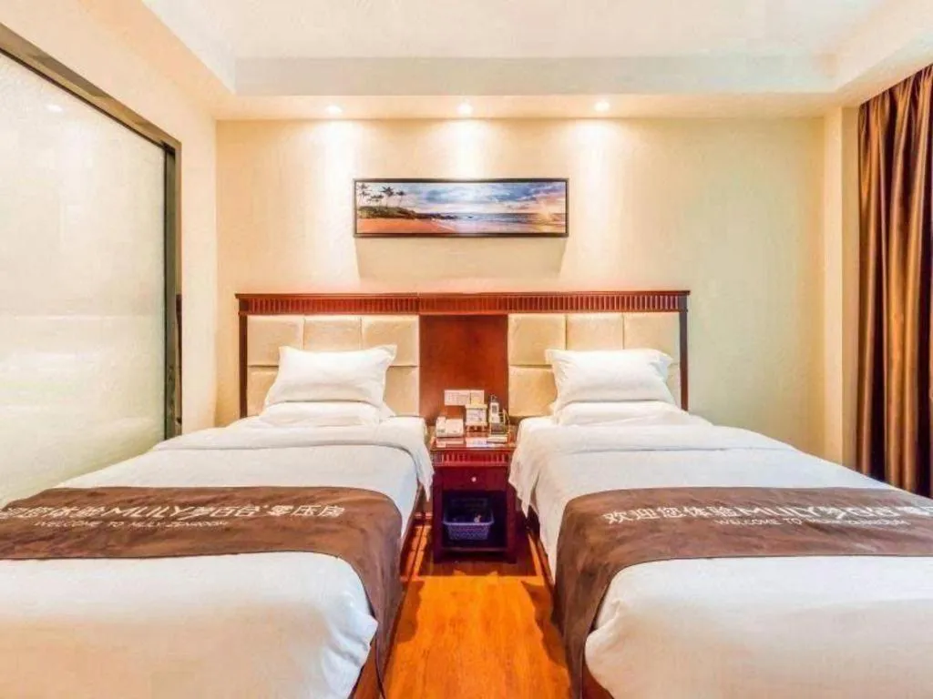 Bed in GreenTree Inn Guangzhou Baiyun International Airport Huaxi Road Express Hotel