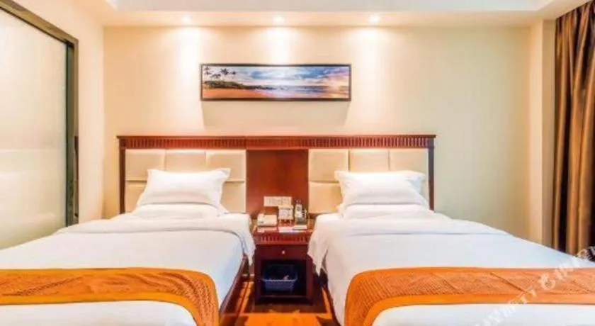 Bed in GreenTree Inn Guangzhou Baiyun International Airport Huaxi Road Express Hotel