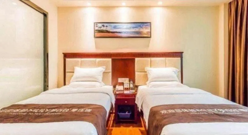 Bed in GreenTree Inn Guangzhou Baiyun International Airport Huaxi Road Express Hotel