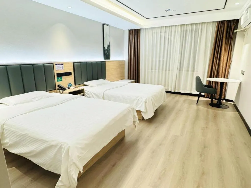 Bed in GreenTree Inn ShangHai KangQiao Industrial Zone JinXiu Road Business Hotel