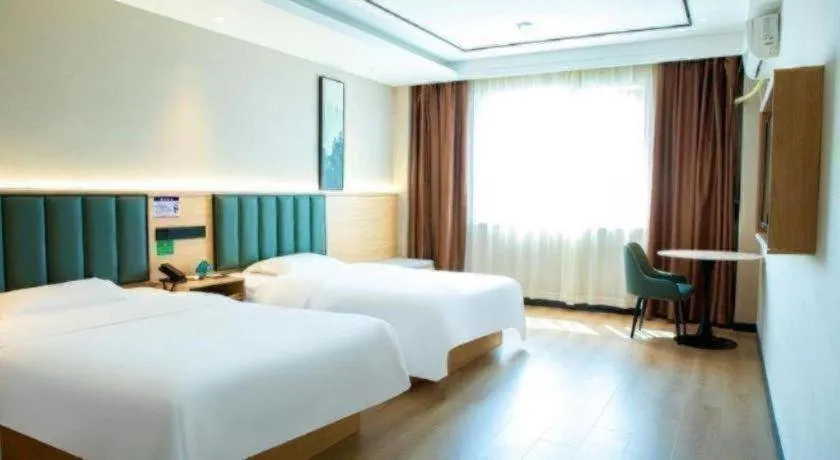 Bed in GreenTree Inn ShangHai KangQiao Industrial Zone JinXiu Road Business Hotel