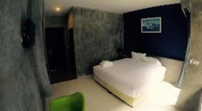 Bed in The Peak Boutique Hotel