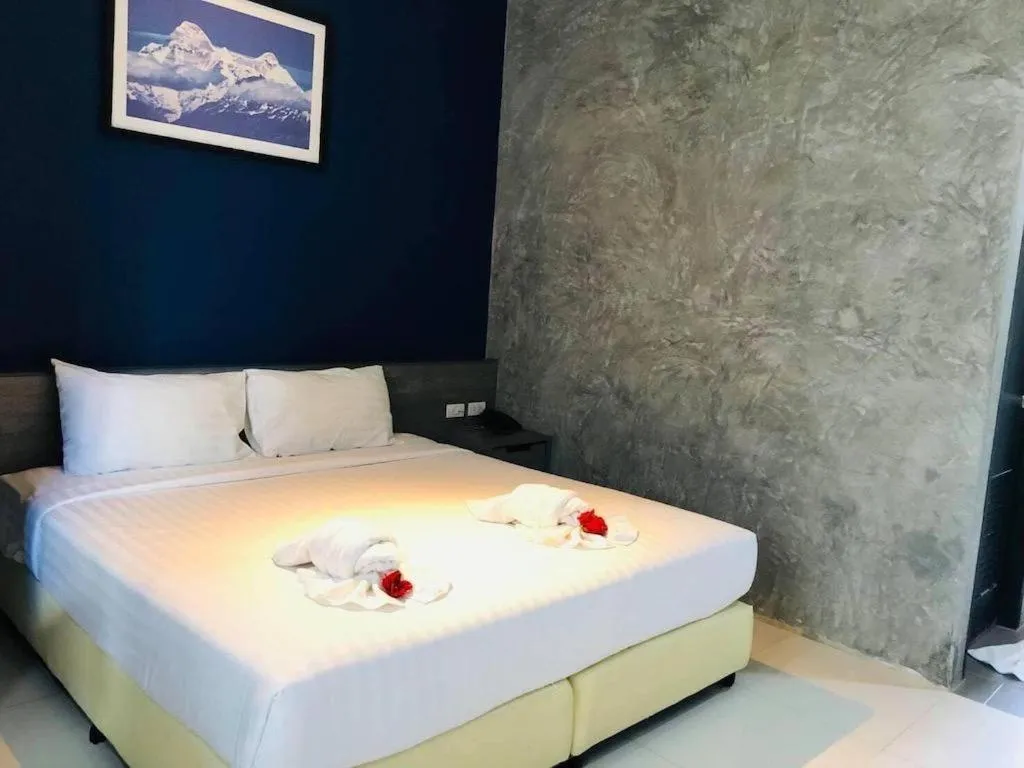 Bed in The Peak Boutique Hotel