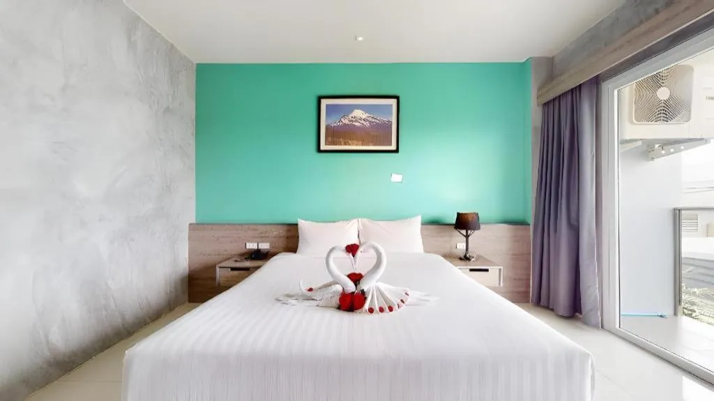 Bed in The Peak Boutique Hotel