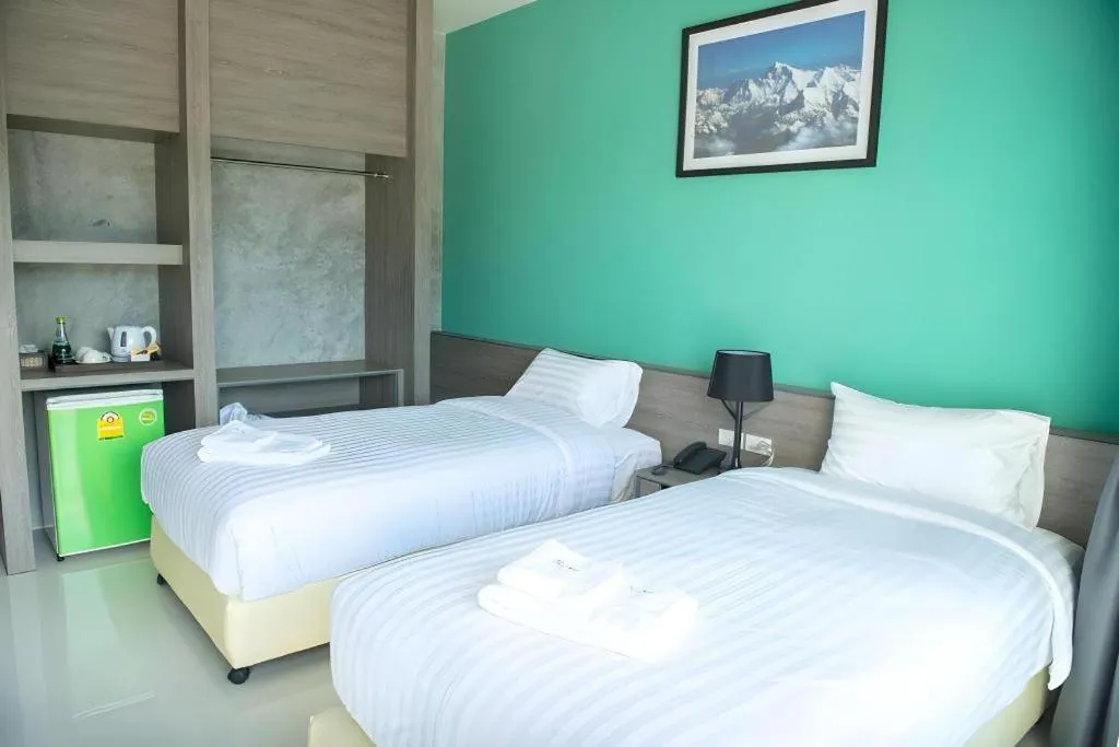 Bed in The Peak Boutique Hotel