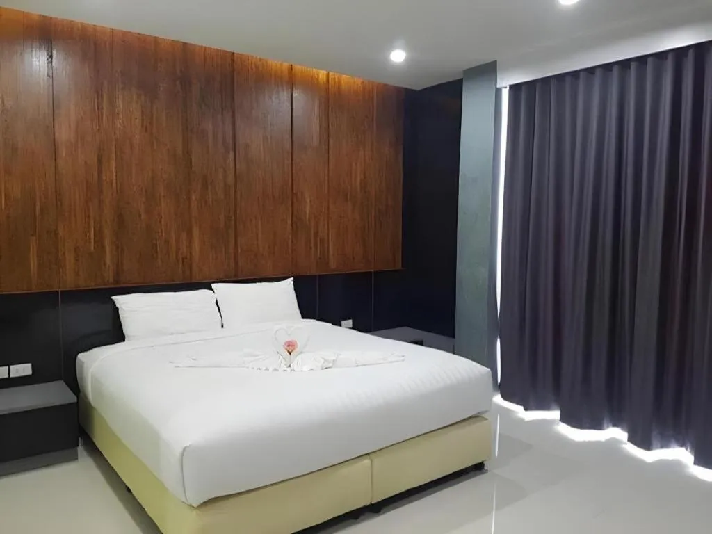 Bed in The Peak Boutique Hotel