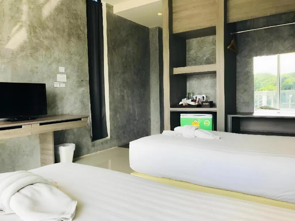 Bed in The Peak Boutique Hotel