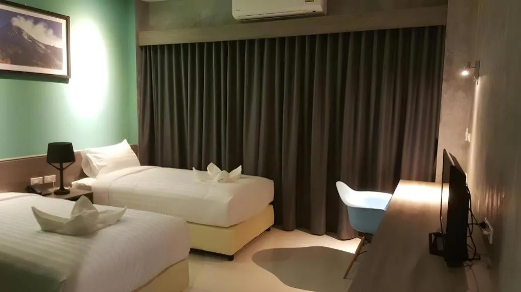 Bed in The Peak Boutique Hotel