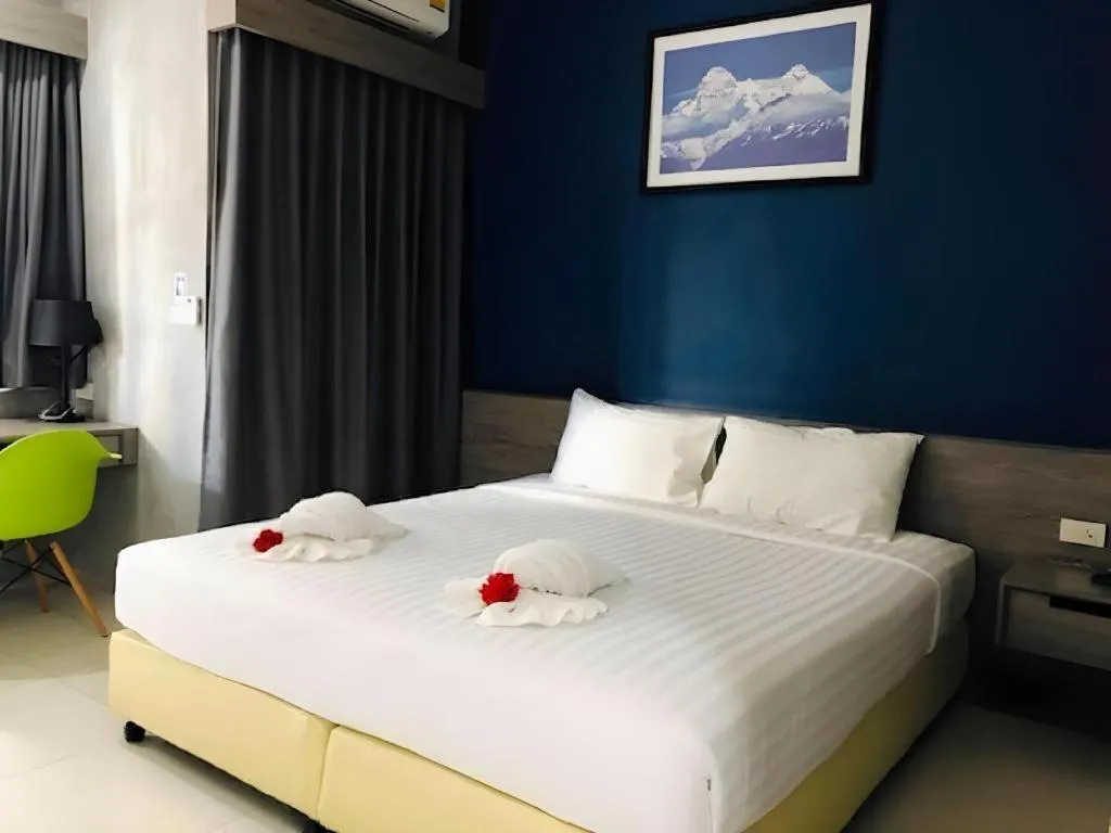 Bed in The Peak Boutique Hotel