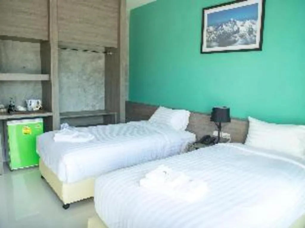 Bed in The Peak Boutique Hotel