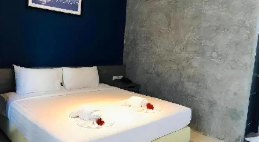 Bed in The Peak Boutique Hotel