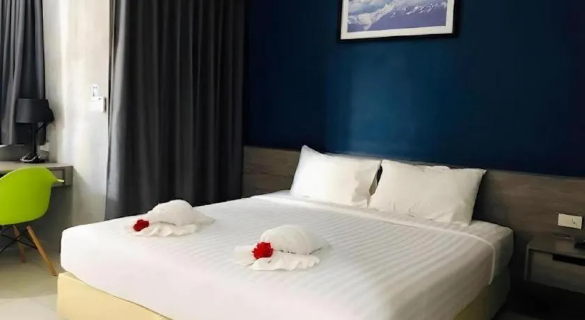 Bed in The Peak Boutique Hotel