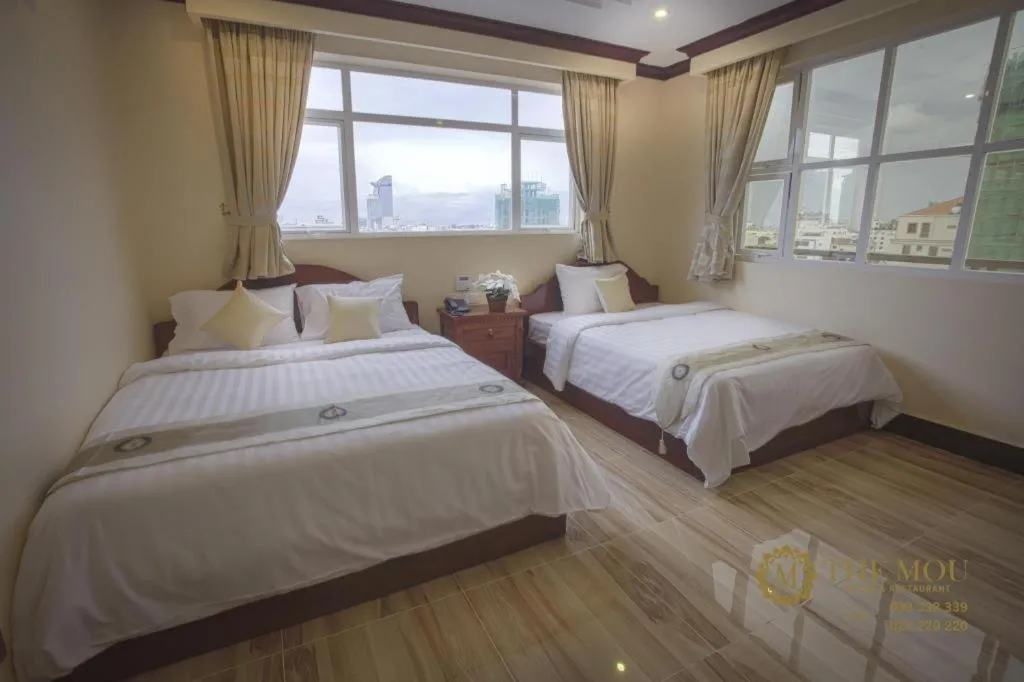 Bed in The Mou Hotel