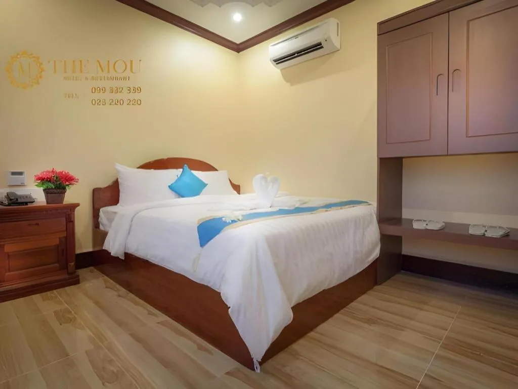 Bed in The Mou Hotel